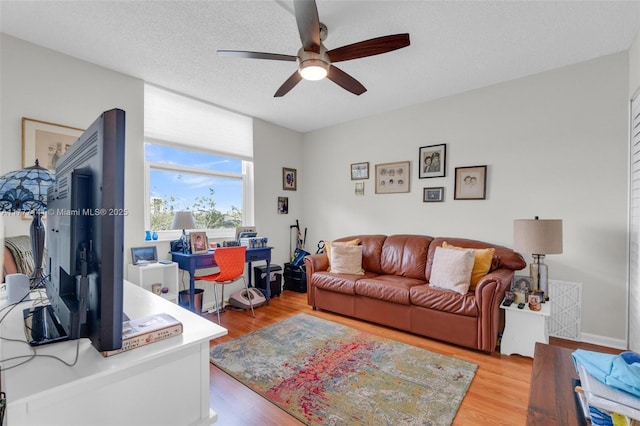 14773 Cumberland Dr Unit 208, Delray Beach, FL 33446 - living room with ceiling fan and light wood finished floors