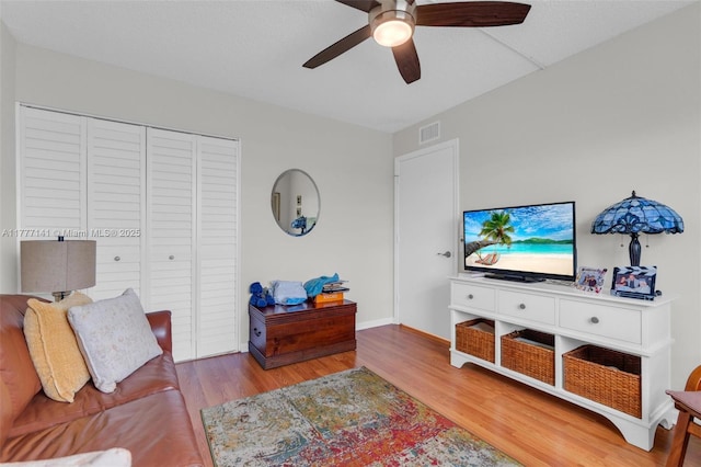 14773 Cumberland Dr Unit 208, Delray Beach, FL 33446 - living room featuring ceiling fan, wood finished floors, and baseboards