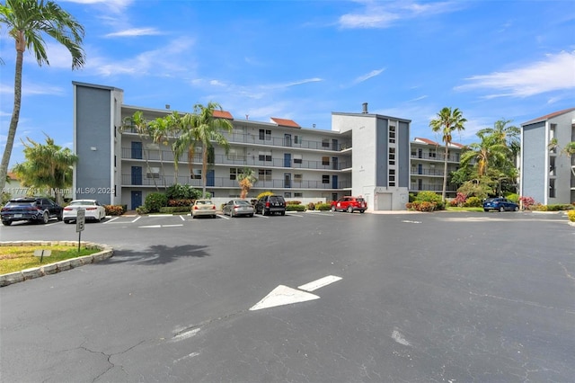 14773 Cumberland Dr Unit 208, Delray Beach, FL 33446 - view of apartment building / complex featuring uncovered parking