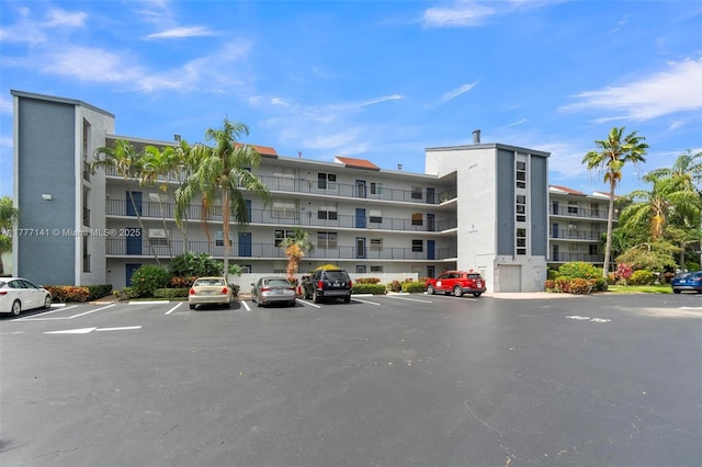 14773 Cumberland Dr Unit 208, Delray Beach, FL 33446 - view of apartment building / complex with uncovered parking