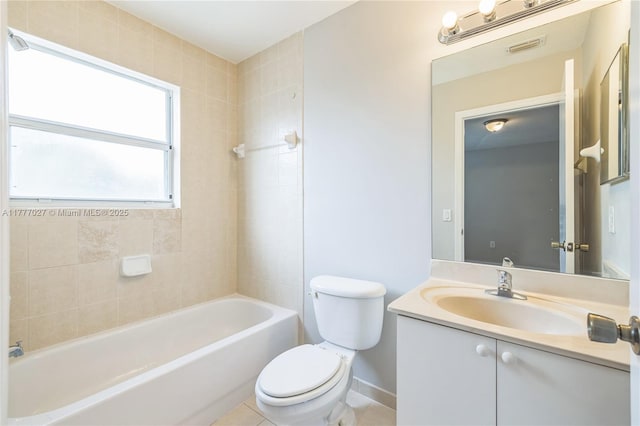 bathroom featuring visible vents, baseboards, toilet, vanity, and tile patterned flooring