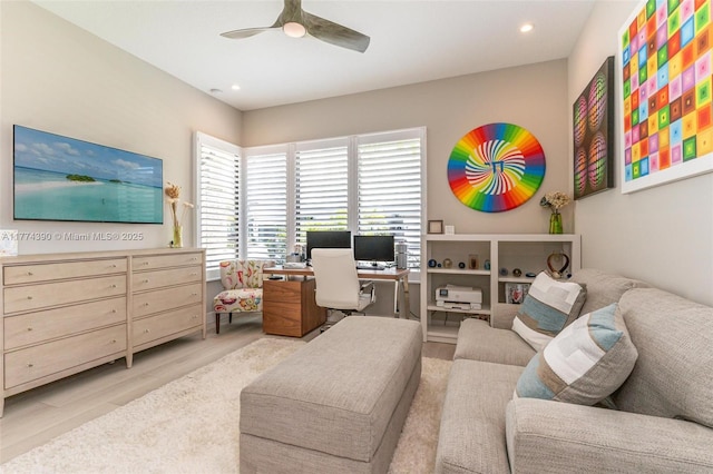 office with light wood-type flooring, recessed lighting, and a ceiling fan