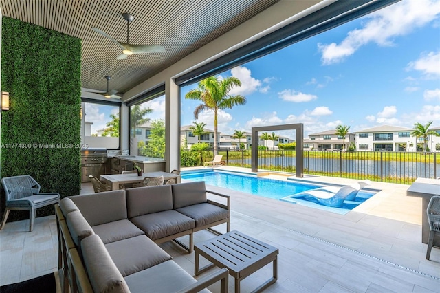 view of swimming pool with fence, a water view, an outdoor living space, area for grilling, and a patio area