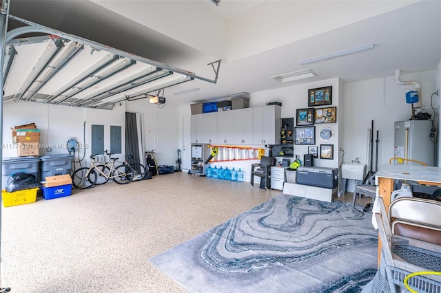 garage featuring french doors, gas water heater, electric panel, and a garage door opener