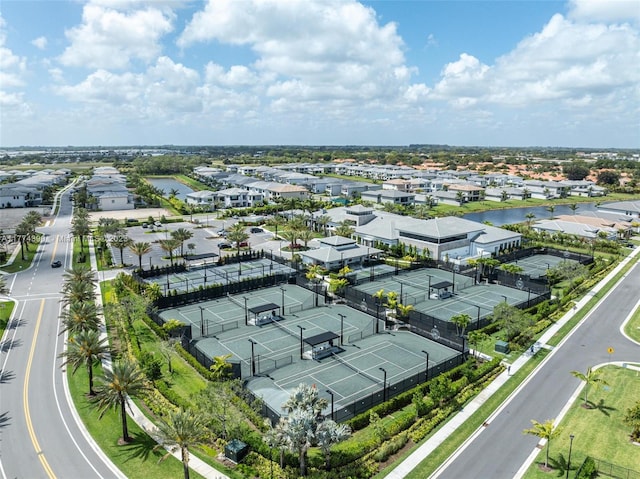 bird's eye view with a residential view and a water view