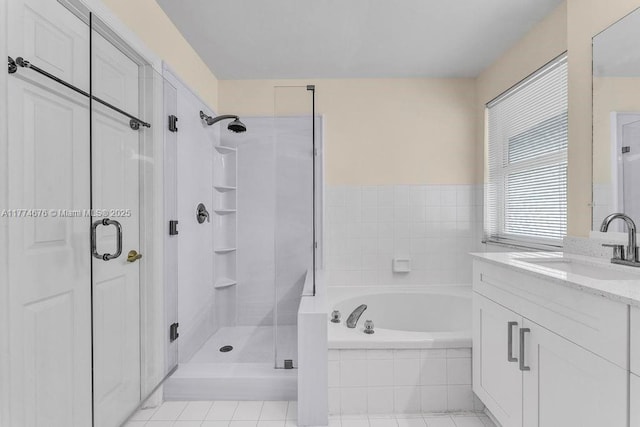16226 Opal Creek Dr, Weston, FL 33331 - bathroom with vanity, a garden tub, and a shower stall
