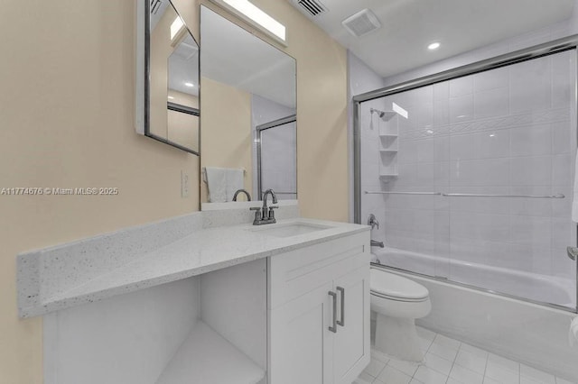 16226 Opal Creek Dr, Weston, FL 33331 - full bathroom featuring toilet, vanity, visible vents, tile patterned flooring, and combined bath / shower with glass door