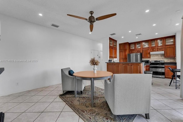16226 Opal Creek Dr, Weston, FL 33331 - living area with a ceiling fan, light tile patterned floors, and visible vents
