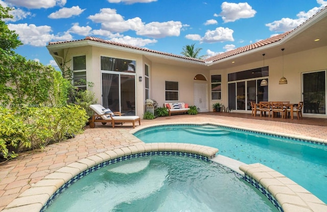 1604 Victoria Pointe Ln, Weston, FL 33327 - view of pool with a pool with connected hot tub and a patio