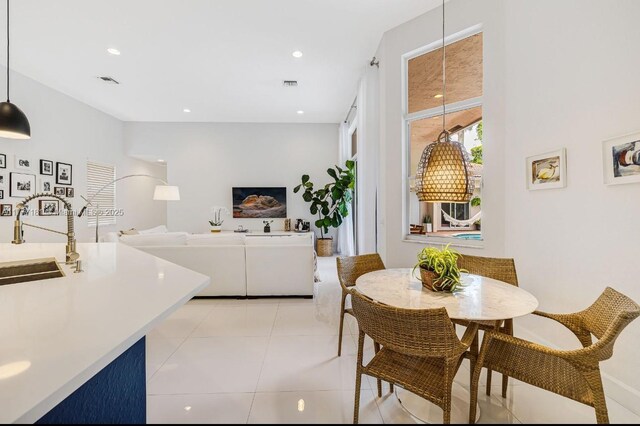 1604 Victoria Pointe Ln, Weston, FL 33327 - dining room featuring light tile patterned floors and recessed lighting