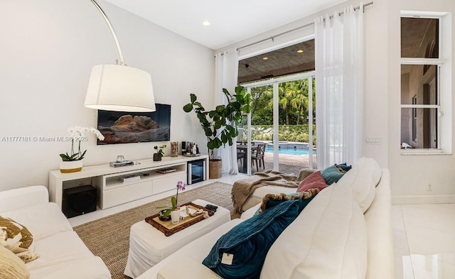 1604 Victoria Pointe Ln, Weston, FL 33327 - tiled living area featuring baseboards and recessed lighting