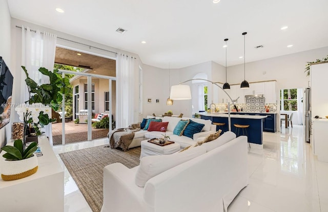 1604 Victoria Pointe Ln, Weston, FL 33327 - living room with recessed lighting and light tile patterned flooring