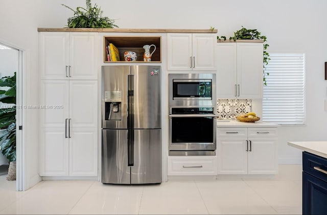 1604 Victoria Pointe Ln, Weston, FL 33327 - kitchen featuring appliances with stainless steel finishes, white cabinetry, light countertops, and open shelves