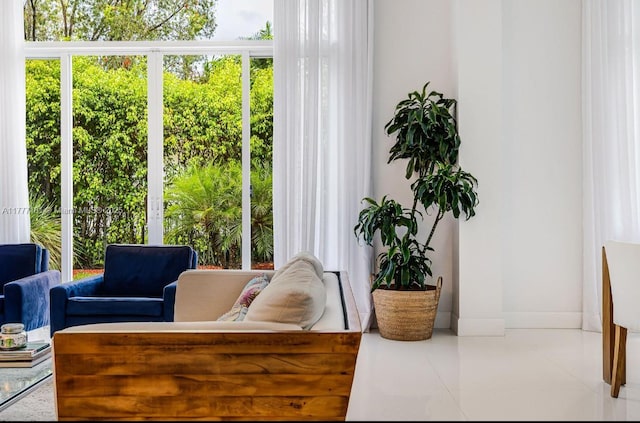 1604 Victoria Pointe Ln, Weston, FL 33327 - sitting room featuring plenty of natural light and tile patterned floors