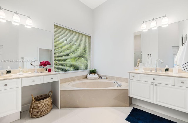 1604 Victoria Pointe Ln, Weston, FL 33327 - full bathroom featuring two vanities, a garden tub, and tile patterned floors