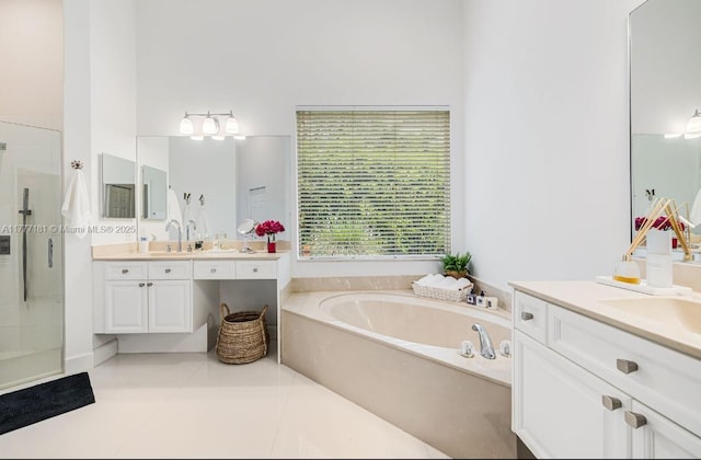 1604 Victoria Pointe Ln, Weston, FL 33327 - full bathroom featuring a bath, two vanities, a walk in shower, and tile patterned flooring