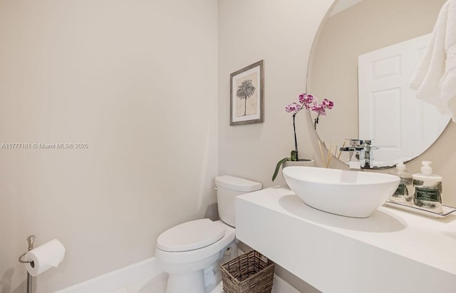 1604 Victoria Pointe Ln, Weston, FL 33327 - half bathroom featuring toilet and vanity