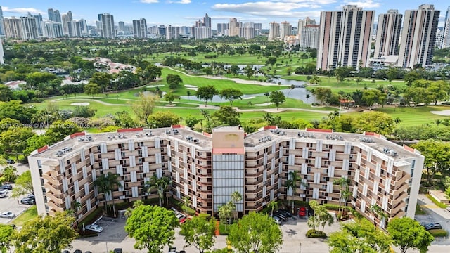 3301 N Country Club Dr Unit 612, Aventura, FL 33180 - aerial view with golf course view, a view of city, and a water view