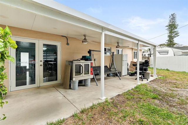4814 SW 20th St, Fort Lauderdale, FL 33317 - view of patio / terrace with french doors, fence, and ceiling fan