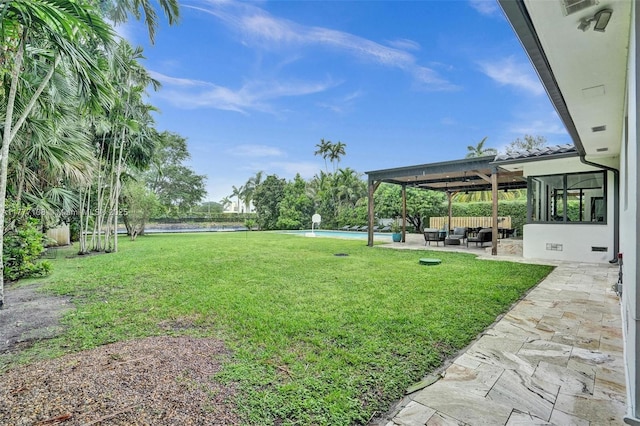 11060 Griffing Blvd, Biscayne Park, FL 33161 - view of yard with a water view, outdoor lounge area, a patio, and an outdoor pool