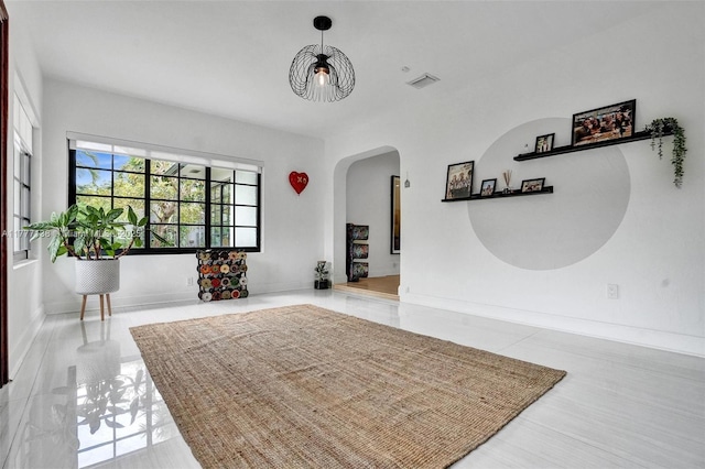 11060 Griffing Blvd, Biscayne Park, FL 33161 - tiled dining space featuring visible vents, baseboards, and arched walkways
