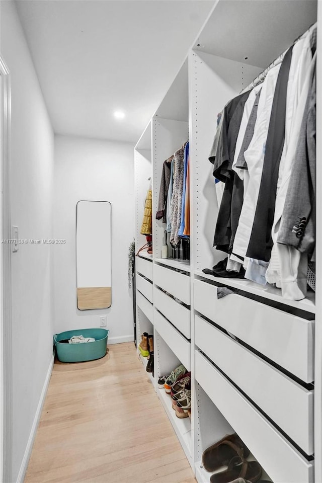 11060 Griffing Blvd, Biscayne Park, FL 33161 - walk in closet featuring wood finished floors