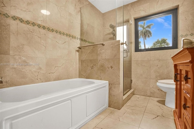 11060 Griffing Blvd, Biscayne Park, FL 33161 - full bath with a garden tub, toilet, marble finish floor, tile walls, and a stall shower