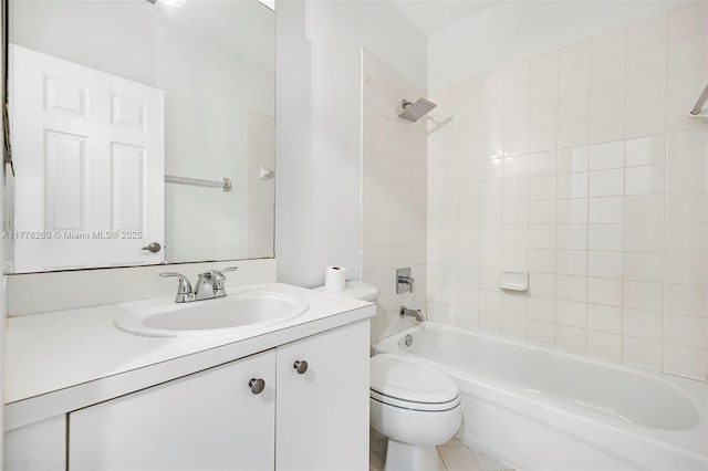 bathroom with toilet, vanity, and shower / tub combination