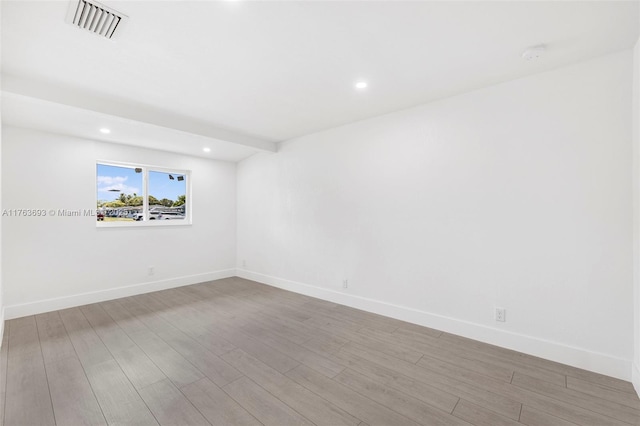 6335 Southgate Blvd, Margate, FL 33068 - unfurnished room with wood finished floors, recessed lighting, and baseboards