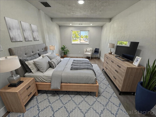 6335 Southgate Blvd, Margate, FL 33068 - bedroom featuring wood finished floors, recessed lighting, a textured ceiling, and baseboards