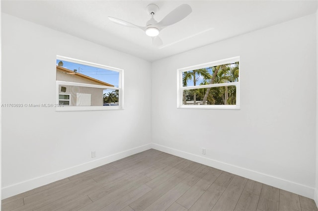 6335 Southgate Blvd, Margate, FL 33068 - unfurnished room with baseboards, wood finished floors, and a ceiling fan