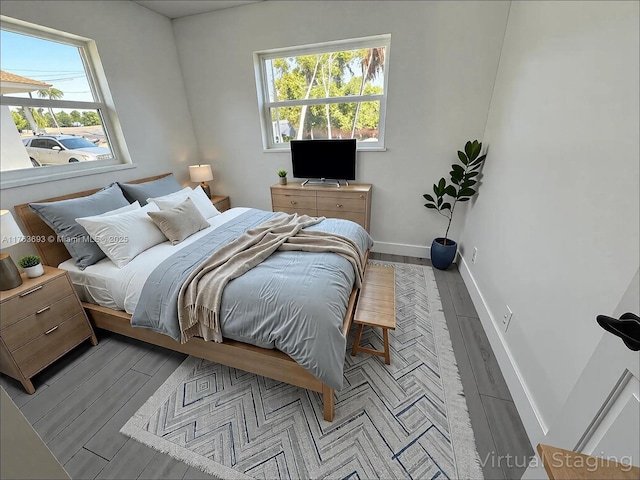 6335 Southgate Blvd, Margate, FL 33068 - bedroom featuring multiple windows, wood finished floors, and baseboards