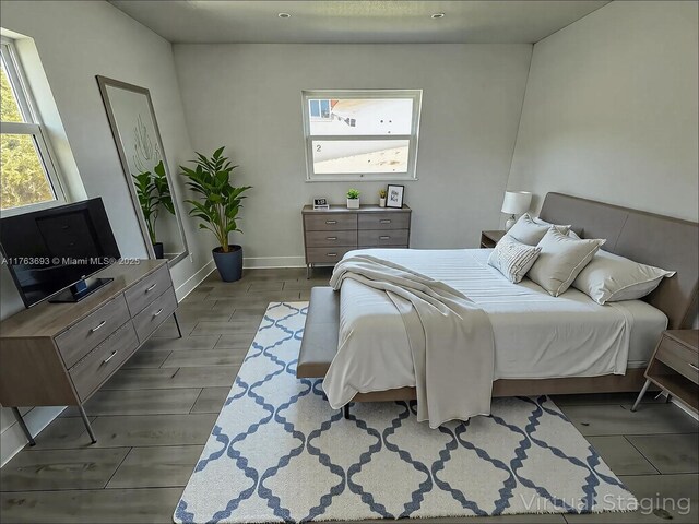6335 Southgate Blvd, Margate, FL 33068 - bedroom with wood finished floors and baseboards
