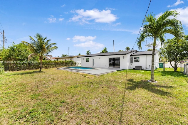 6335 Southgate Blvd, Margate, FL 33068 - back of house with a fenced backyard, stucco siding, and a patio