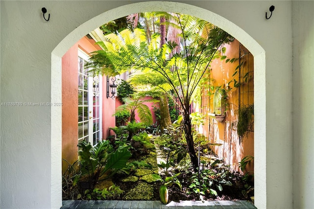 view of yard with french doors