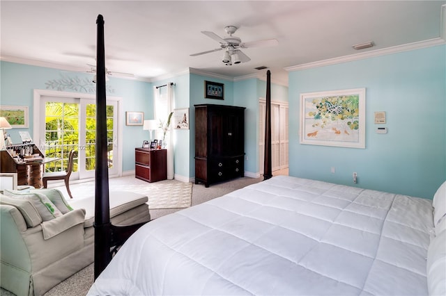 carpeted bedroom with baseboards, a ceiling fan, visible vents, and crown molding