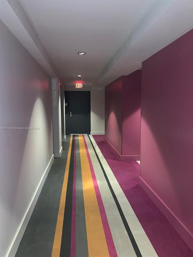 55 SE 6th St Unit 2404, Miami, FL 33131 - hallway featuring carpet and baseboards