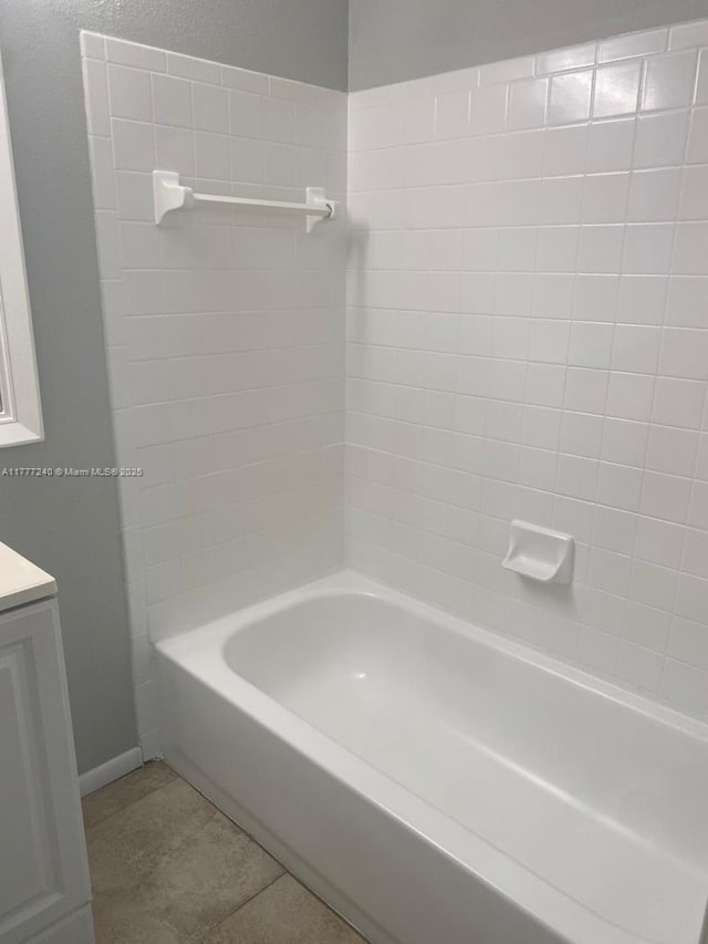 2607 NW 33rd St Unit 2111, Oakland Park, FL 33309 - bathroom with tub / shower combination, tile patterned flooring, and vanity