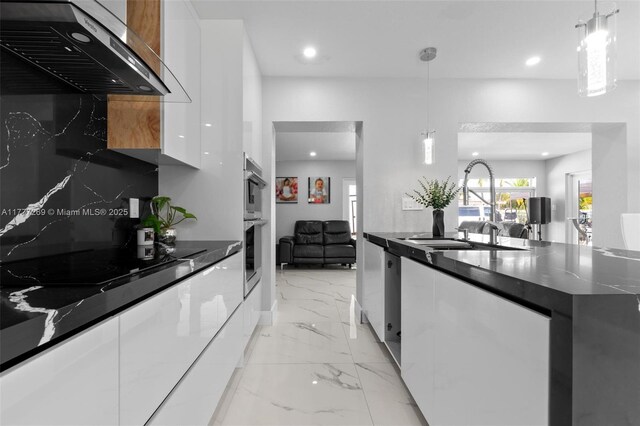 9025 SW 56th St, Miami, FL 33165 - kitchen with modern cabinets, wall chimney exhaust hood, a sink, dark countertops, and recessed lighting