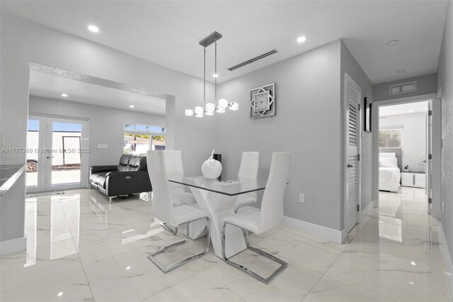 9025 SW 56th St, Miami, FL 33165 - dining area featuring light marble finish flooring, recessed lighting, and french doors