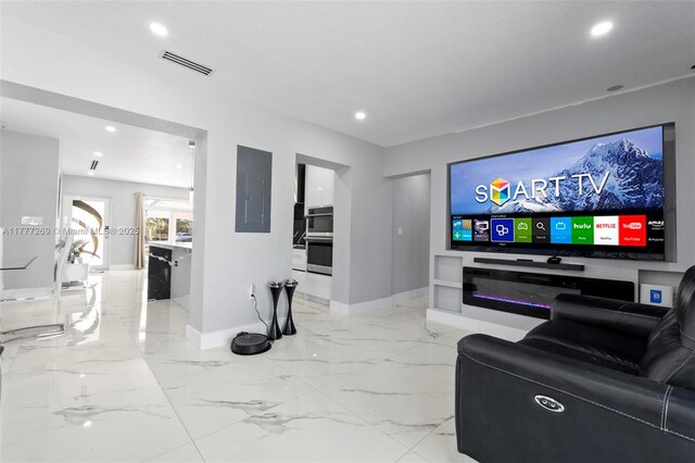 9025 SW 56th St, Miami, FL 33165 - home theater room with baseboards, electric panel, recessed lighting, and light marble finish floors