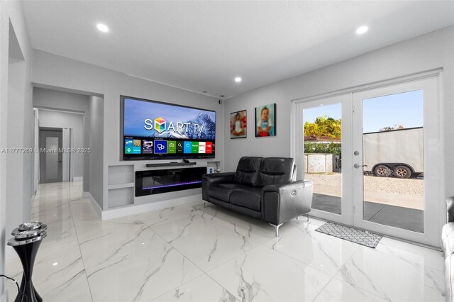 9025 SW 56th St, Miami, FL 33165 - living area with recessed lighting, french doors, and marble finish flooring