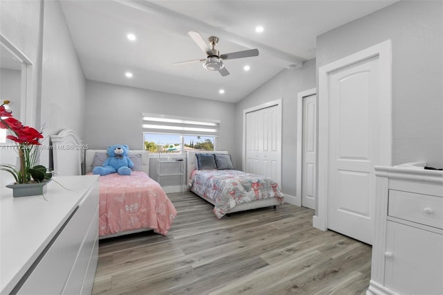 9025 SW 56th St, Miami, FL 33165 - bedroom featuring light wood-style floors, two closets, a ceiling fan, and recessed lighting