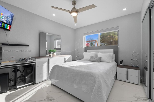 9025 SW 56th St, Miami, FL 33165 - bedroom with light marble finish flooring, recessed lighting, and ceiling fan