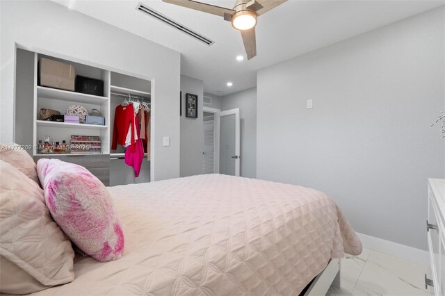 9025 SW 56th St, Miami, FL 33165 - bedroom featuring a closet, recessed lighting, marble look tiles, a ceiling fan, and baseboards