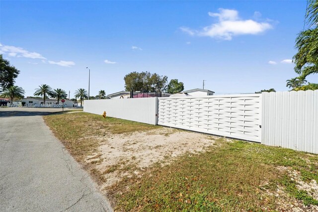 9025 SW 56th St, Miami, FL 33165 - view of yard featuring a gate
