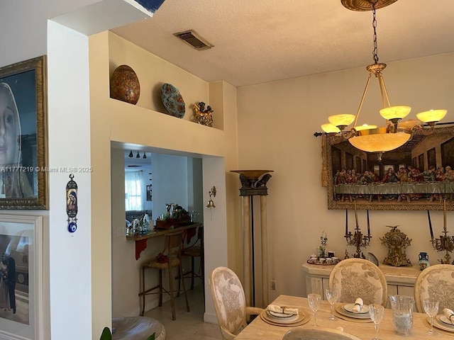 12421 SW 76th St, Miami, FL 33183 - dining area featuring visible vents and a textured ceiling