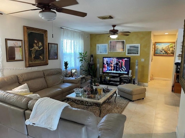 12421 SW 76th St, Miami, FL 33183 - living room with light tile patterned floors, visible vents, baseboards, and ceiling fan