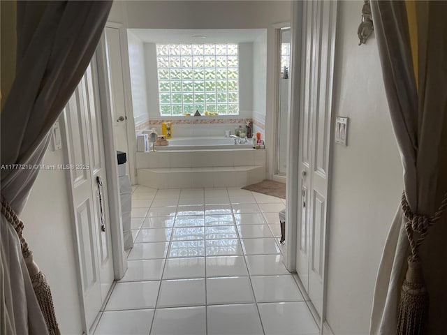 12421 SW 76th St, Miami, FL 33183 - bathroom with an enclosed shower, tile patterned floors, and a garden tub