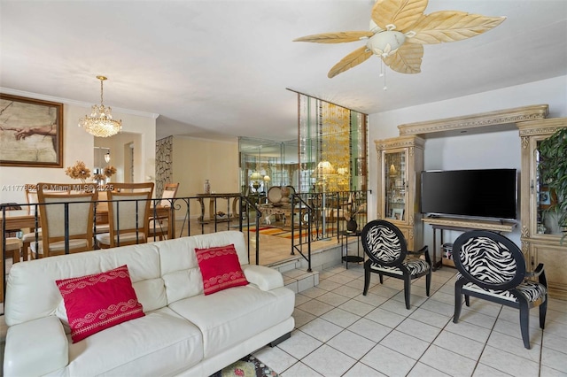 living room with light tile patterned floors, crown molding, and ceiling fan with notable chandelier